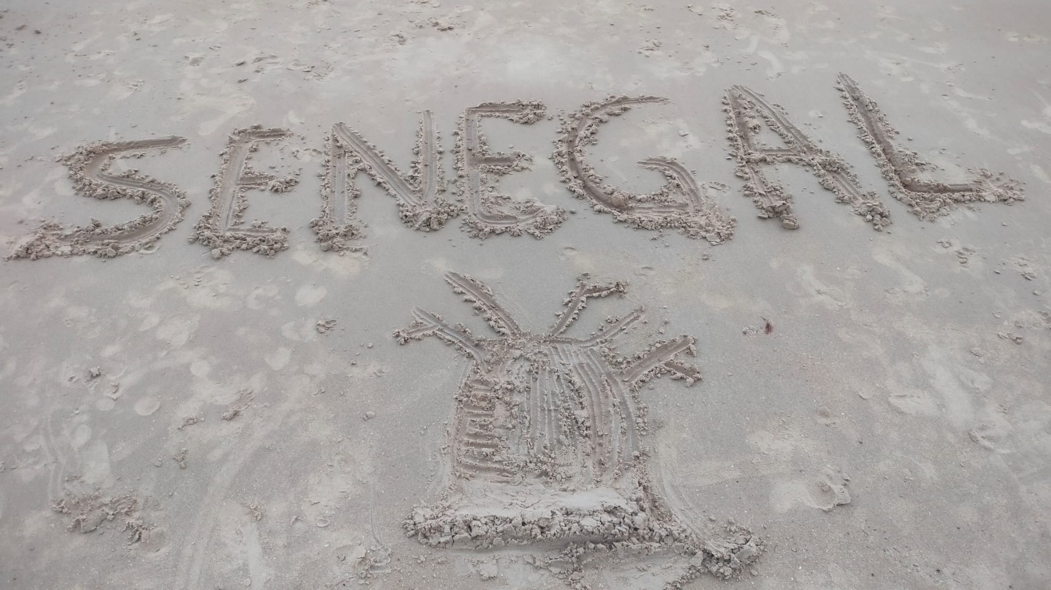 Senegal escrito en la arena
